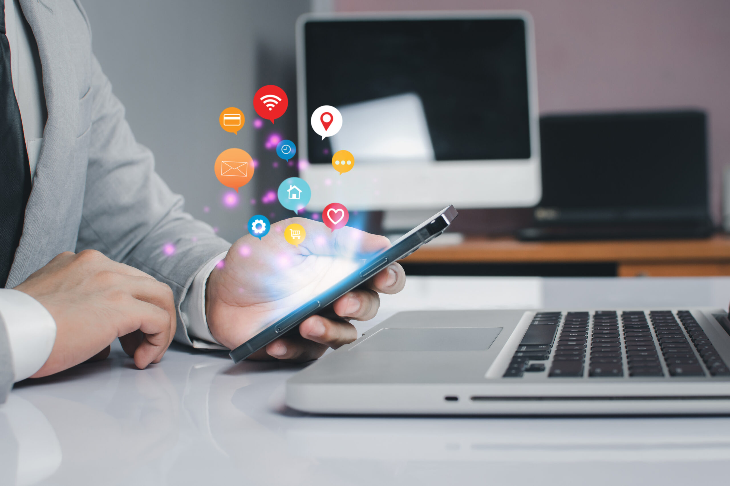 Business people are using innovative technology. Mixed media, digital concepts and computer whit phone.